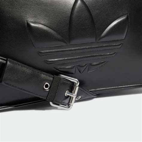polyurethane embossed trefoil shoulder bag